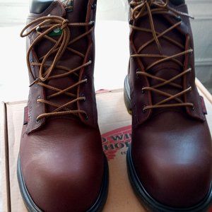 a leather jacket , a pair of redwing shoes.